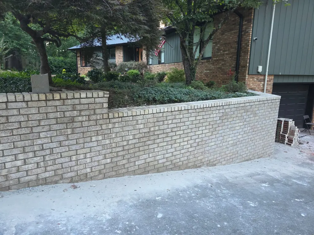 Finished tan brick retaining wall built in Knoxville, Tennessee