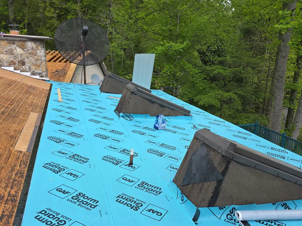 Roofing crew working a residential replacement in Knoxville